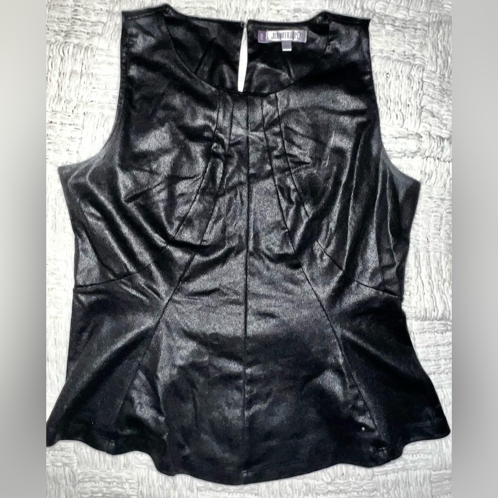 Black, peplum top in size large by Jennifer Lopez.  Shiny, leather-like material